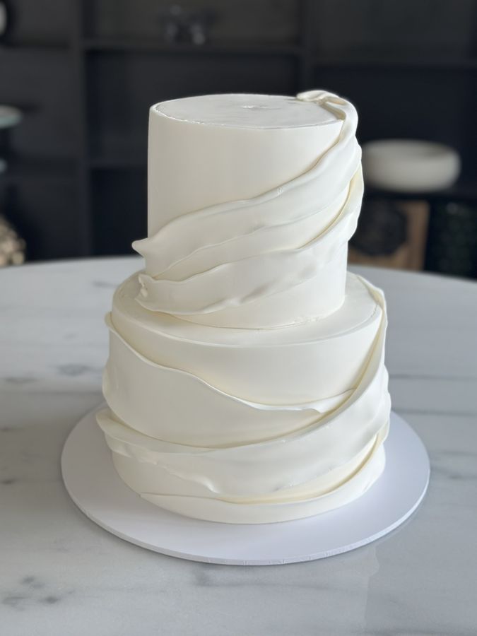 Ruffled white tiers